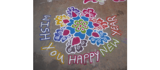 Colorful floral design and text on a sidewalk. Text reads 'Wish You Happy New Year'